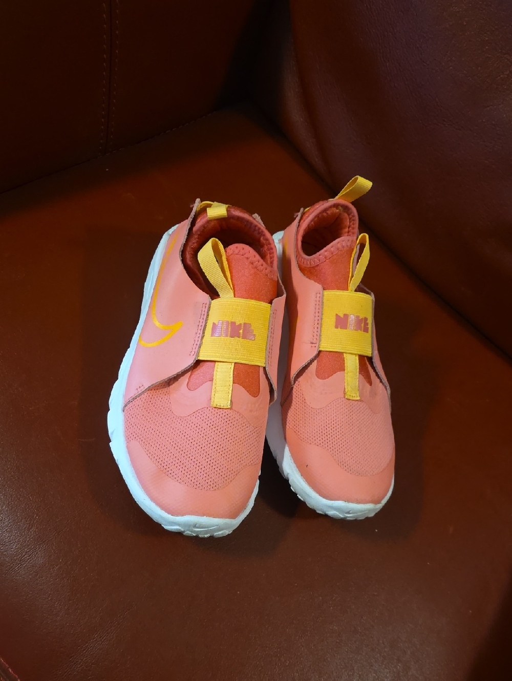 Nike Kids Coral Orange Slip-On Sneakers with Yellow Strap